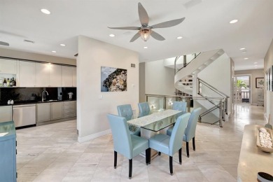 Newly priced! This gorgeous three level townhome located in an