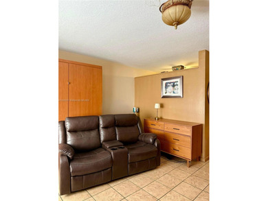 Beautiful and bright 1/1 condo in a desirable 55+ community in