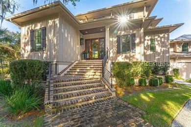 This distinctive custom-built residence nestled among the