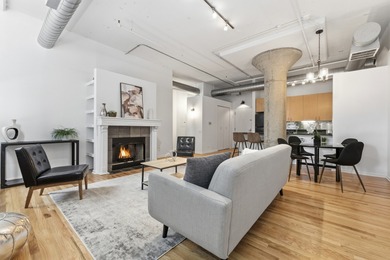 Truly a one-of-a-kind, east-facing loft in the sought-after