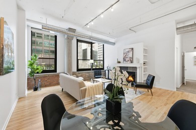 Truly a one-of-a-kind, east-facing loft in the sought-after