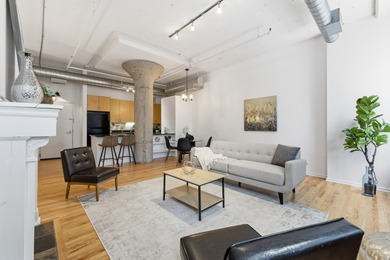 Truly a one-of-a-kind, east-facing loft in the sought-after