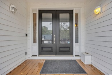 Marsh views from this 2 story, Raised Beach home surrounded by