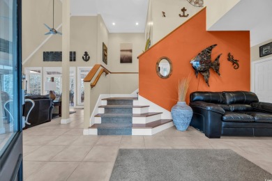 Marsh views from this 2 story, Raised Beach home surrounded by