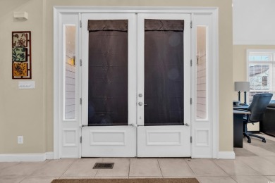 Marsh views from this 2 story, Raised Beach home surrounded by