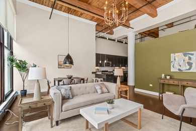 HOT, RARELY AVAILABLE MOTOR ROW LOFTS!  Live in style at this