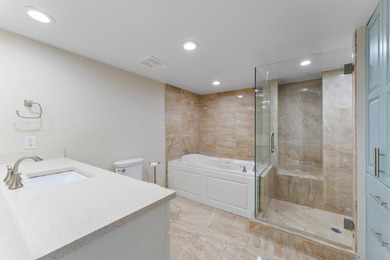 This renovated 2-bedroom, 2-bath ocean-facing corner residence