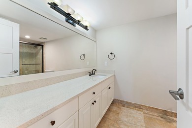 This renovated 2-bedroom, 2-bath ocean-facing corner residence