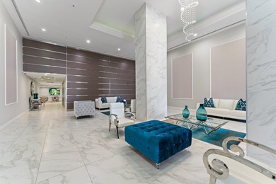 This renovated 2-bedroom, 2-bath ocean-facing corner residence