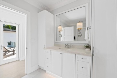 Welcome to an exquisite Palm Beach estate built in 2017