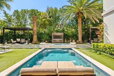 Welcome to an exquisite Palm Beach estate built in 2017