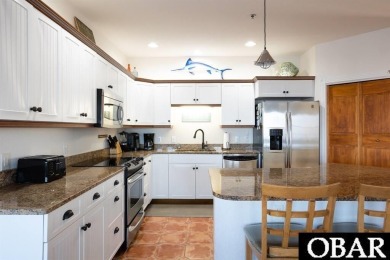 Welcome to coastal living at its finest! This SPACIOUS END UNIT