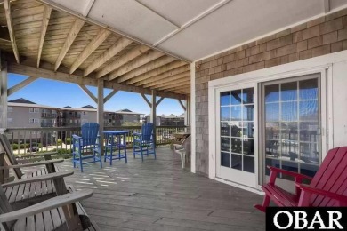 Welcome to coastal living at its finest! This SPACIOUS END UNIT