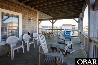 Welcome to coastal living at its finest! This SPACIOUS END UNIT