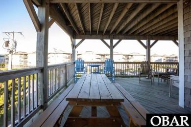 Welcome to coastal living at its finest! This SPACIOUS END UNIT