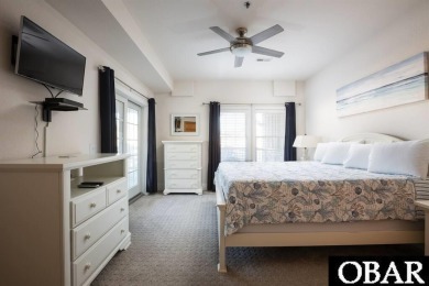 Welcome to coastal living at its finest! This SPACIOUS END UNIT