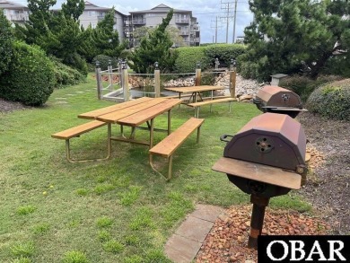 Welcome to coastal living at its finest! This SPACIOUS END UNIT