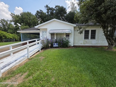 Welcome to this charming 3 bedroom 1.5 bath home located in a