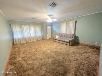 Welcome to this charming 3 bedroom 1.5 bath home located in a