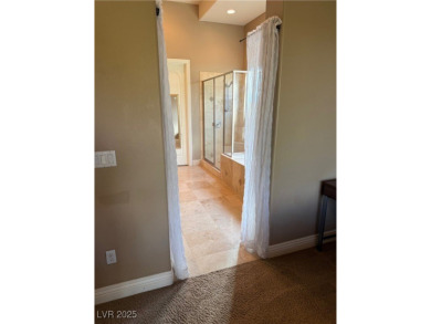 Nestled in guard gated Anthem Country Club comuunity on the 5th