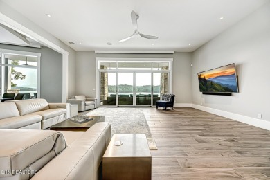 This magnificent lake home offers 6+ bedrooms, 8 full baths, 5