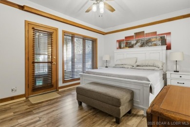 Discover lakeside living at its finest in this beautifully