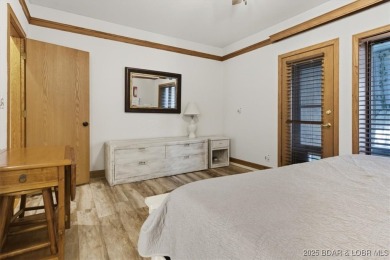 Discover lakeside living at its finest in this beautifully