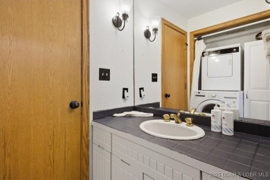 Discover lakeside living at its finest in this beautifully