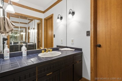 Discover lakeside living at its finest in this beautifully