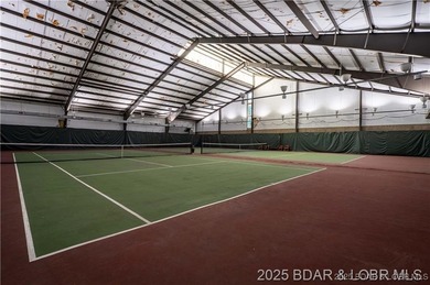 Discover lakeside living at its finest in this beautifully