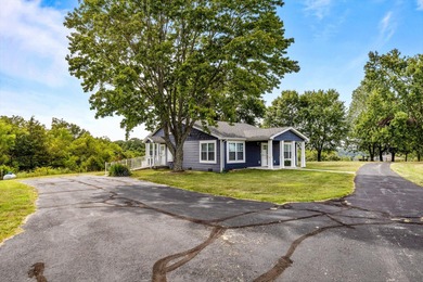 Experience refined country living with this exceptional 15-acre