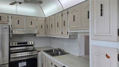 This top-floor unit in the highly sought-after *T* building