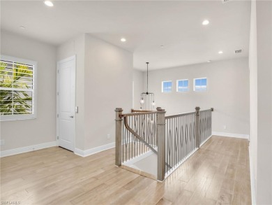 Welcome to this beautifully designed second-floor coach home in