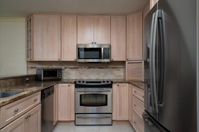 Welcome to 9002 Palmetto Drive, Unit 112 - a first floor