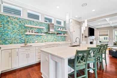 This Custom-Built 5BR/4BA beach retreat is nestled within the