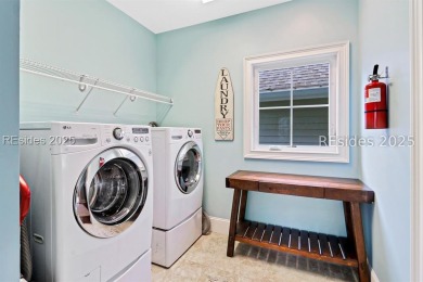 This Custom-Built 5BR/4BA beach retreat is nestled within the