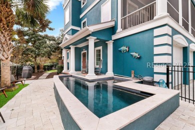 This Custom-Built 5BR/4BA beach retreat is nestled within the