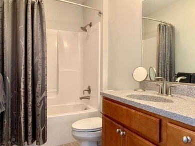 This welcoming 3rd floor corner unit is located in the heart of