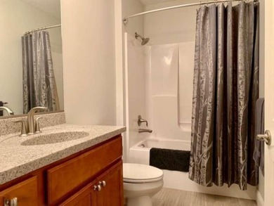 This welcoming 3rd floor corner unit is located in the heart of