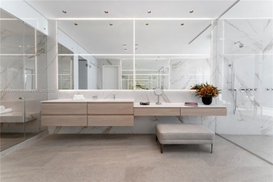 Experience luxury living in this extraordinary waterfront home