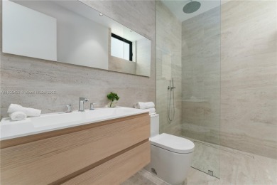 Experience luxury living in this extraordinary waterfront home