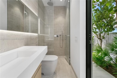 Experience luxury living in this extraordinary waterfront home