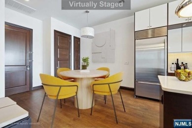 Experience luxury waterfront living in this stunning 2-bedroom