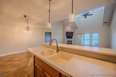 Discover lakeside living at its finest in the sought-after