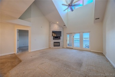 Discover lakeside living at its finest in the sought-after