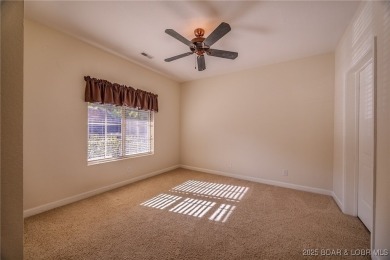 Discover lakeside living at its finest in the sought-after