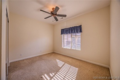 Discover lakeside living at its finest in the sought-after