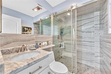 Come live on the beach in this private, boutique building. New