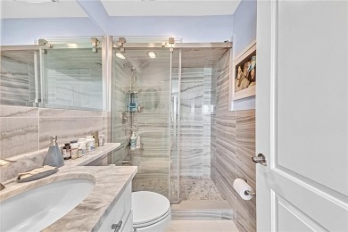 Come live on the beach in this private, boutique building. New