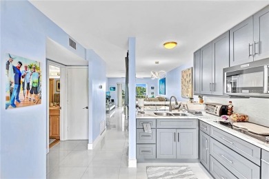 Come live on the beach in this private, boutique building. New